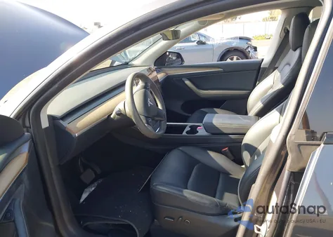 2023 Tesla Model Y Awd/Long Range Dual Motor All-Wheel Drive z USA, uszkodzony, nr VIN 7SAYGDEE2PF896326